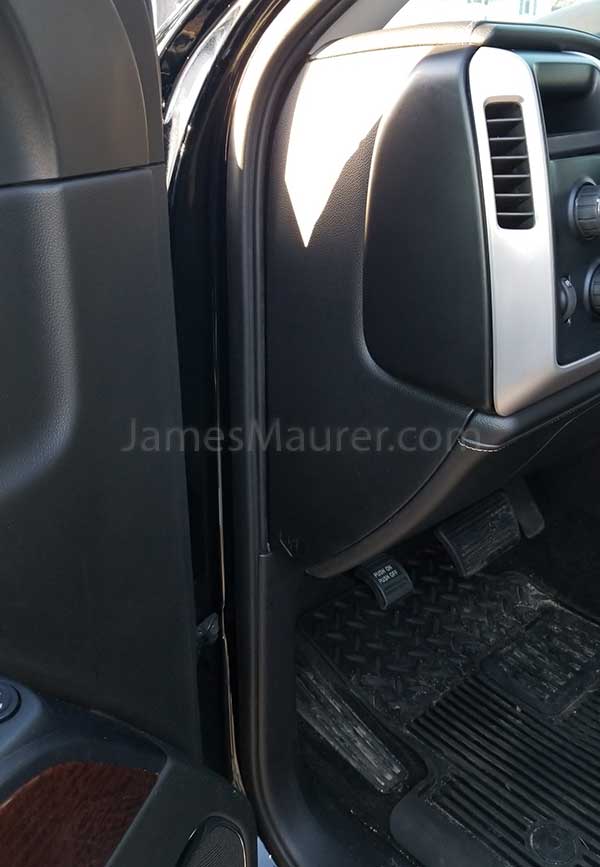 Driver side fuse box enclosure on GMC truck