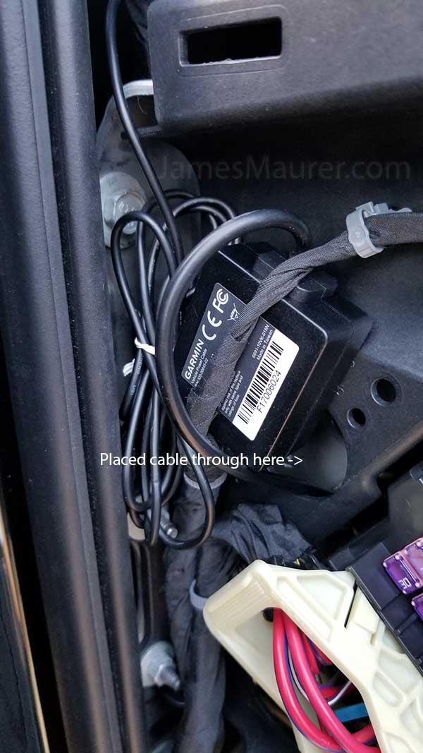 Parking mode power converter tucked near GMC fuse box