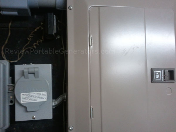 Generator power inlet plug panel on exterior wall