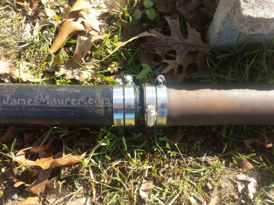 Irrigation pump intake hose patched with four hose clamps