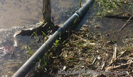 Irrigation pump intake line running to lake water source